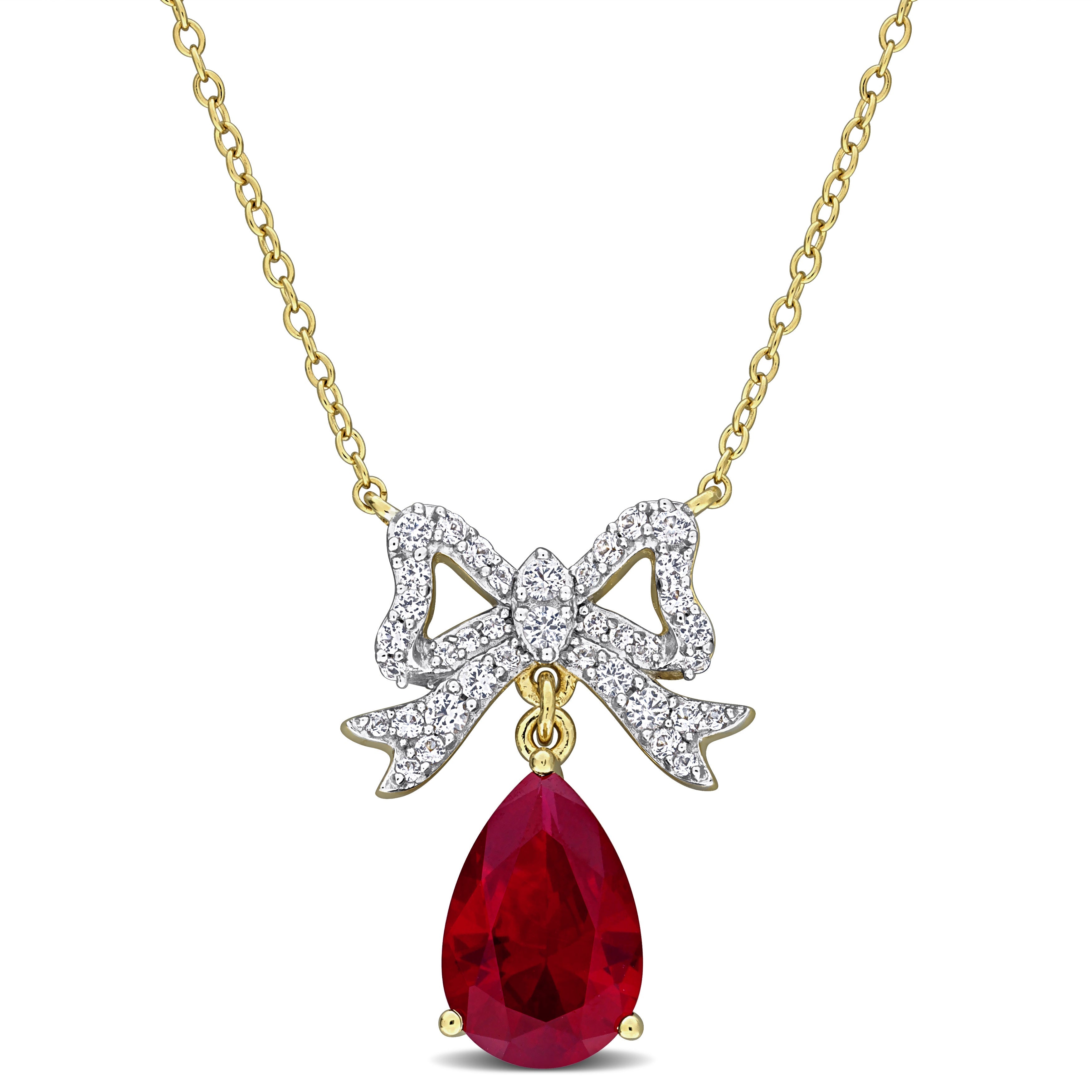 Yellow-plated sterling silver bow necklace with ruby and sapphire gemstones, front view by Delmar