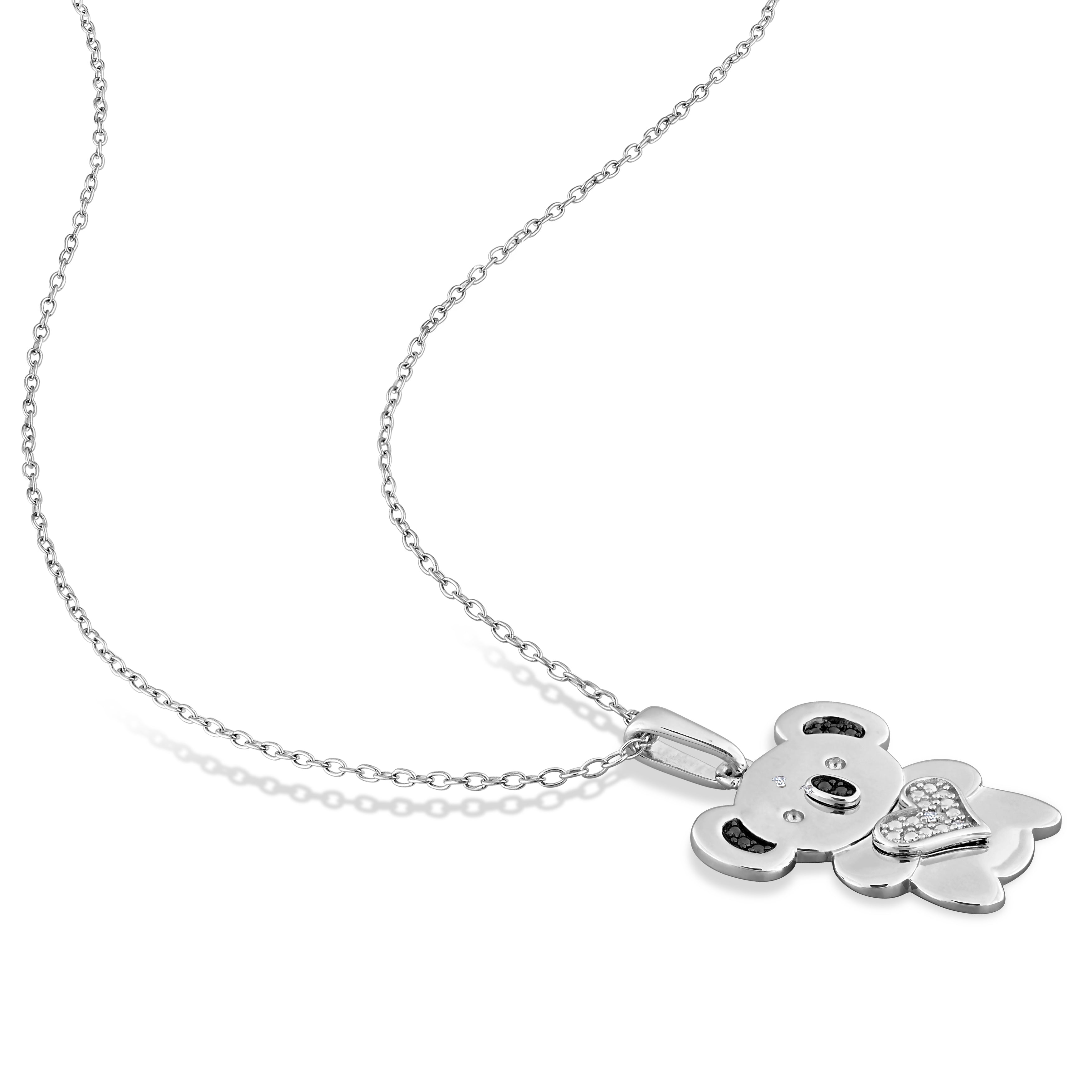 Sterling silver dog pendant necklace detail showing diamond accents and two-tone finish