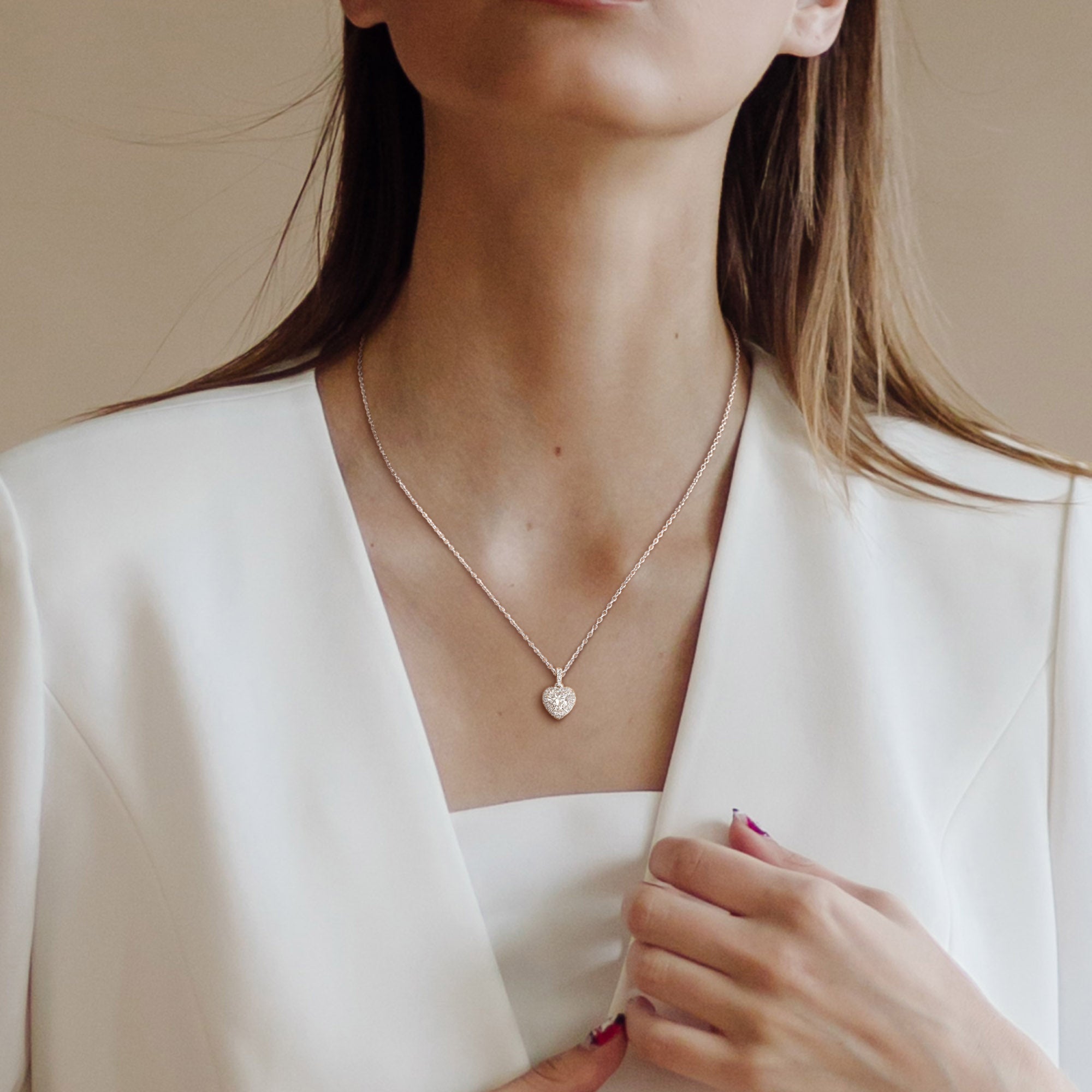 Sterling silver heart-shaped diamond pendant necklace by Lord & Taylor, lifestyle view