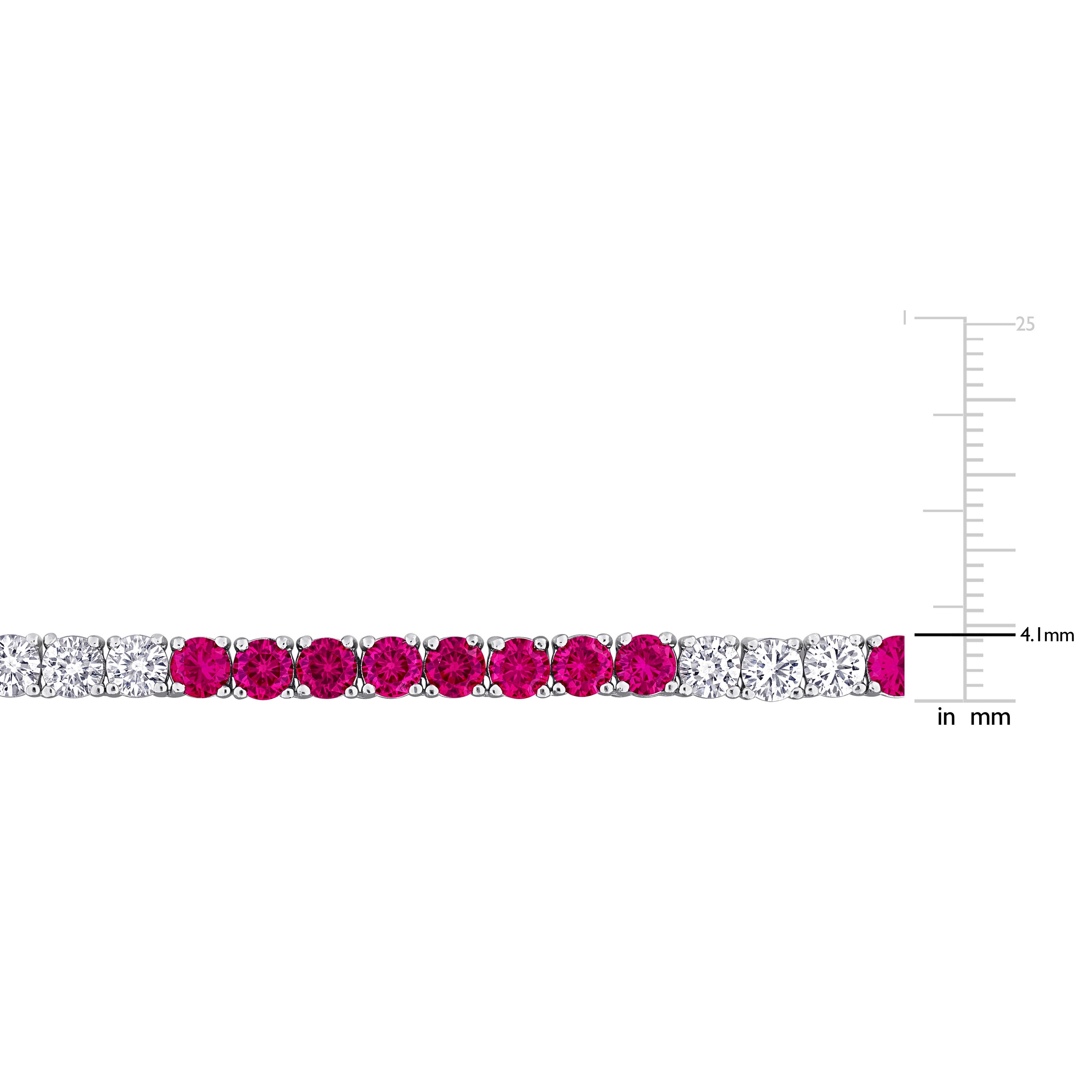 Close-up of 4 x 4 mm round ruby and white sapphire gemstones by Lord & Taylor