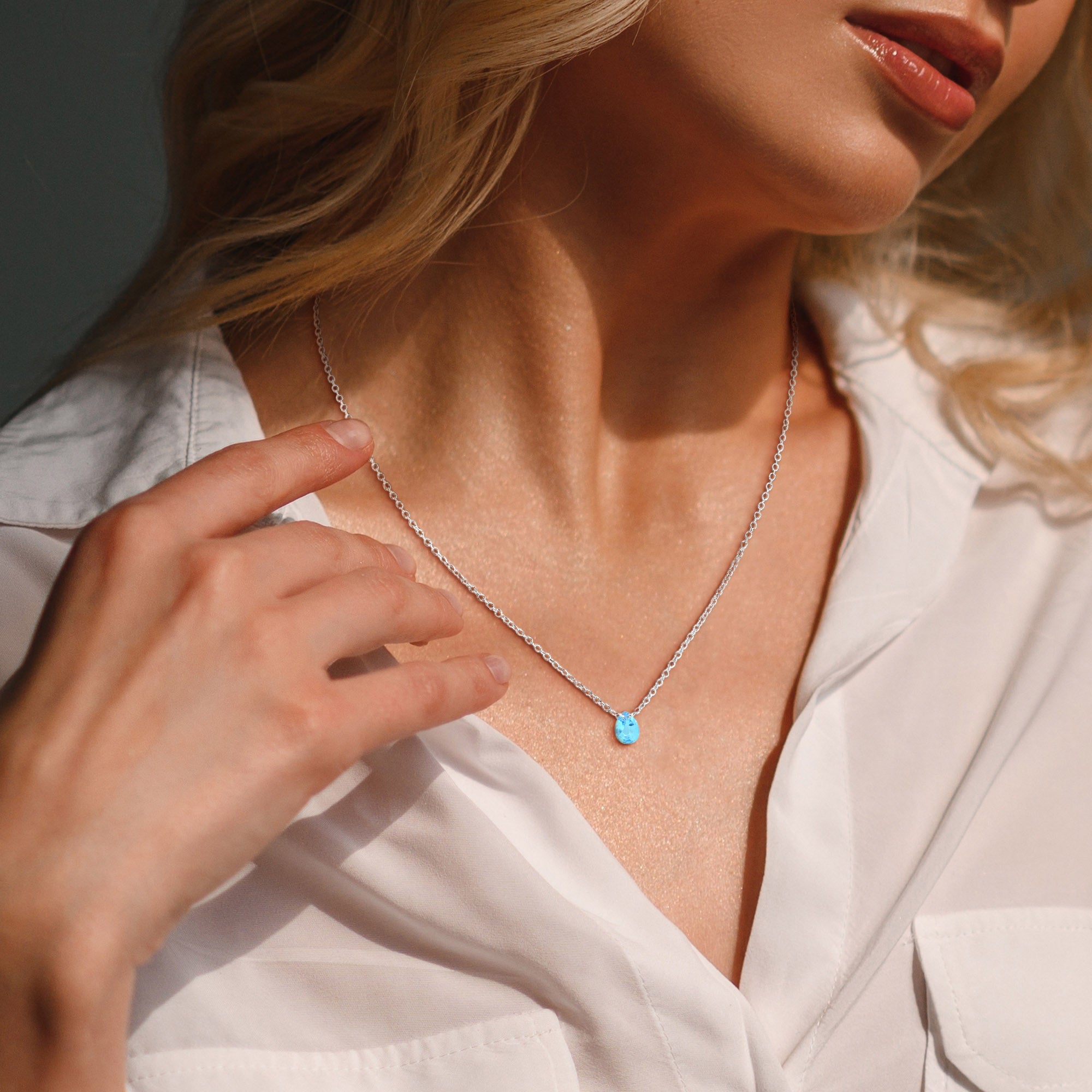 Citrine pear-cut solitaire necklace worn on model showing 17-inch chain length by Lord & Taylor