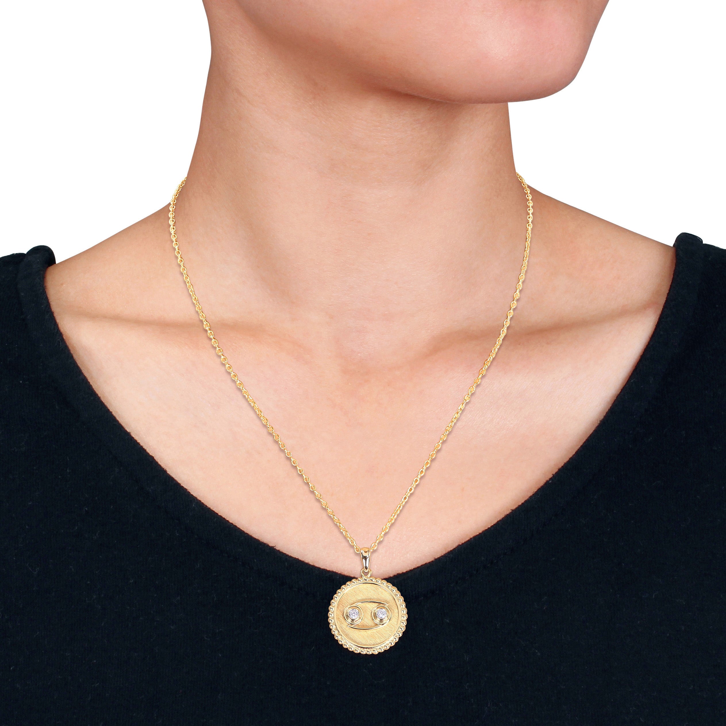 Yellow-plated sterling silver Gemini zodiac pendant necklace, front view by Lord & Taylor