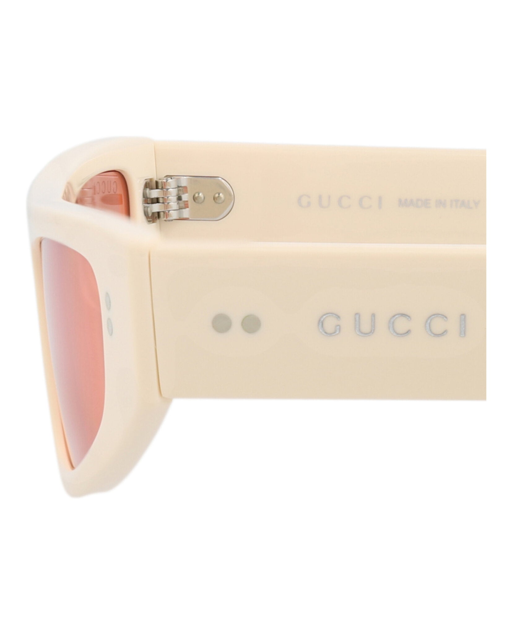 Ivory cat-eye sunglasses with rose lenses by Gucci, folded view