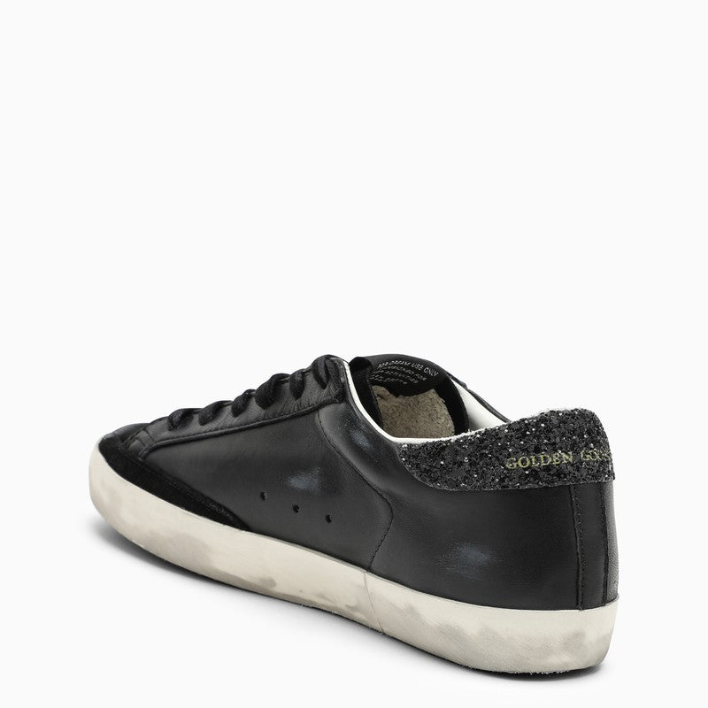 BLACK LEATHER SUPERSTAR SNEAKERS Golden Goose