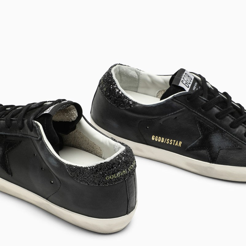 BLACK LEATHER SUPERSTAR SNEAKERS Golden Goose