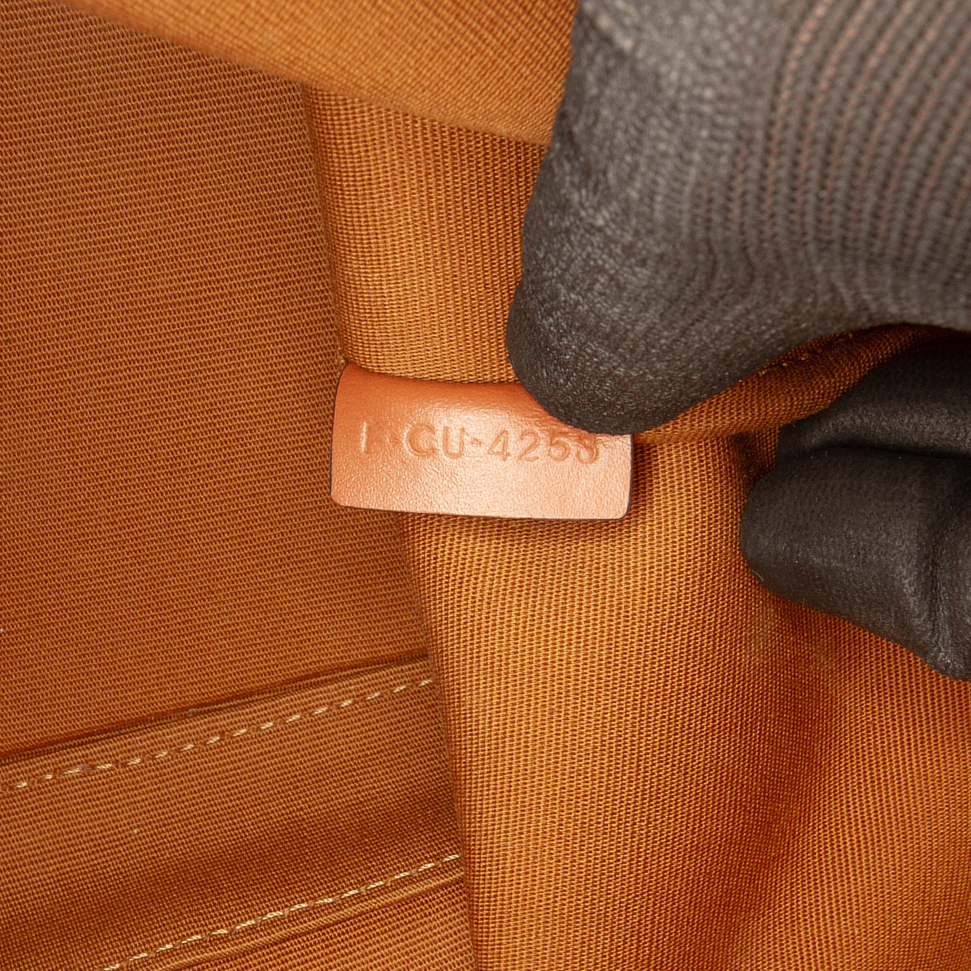Celine Small Triomphe bucket bag, bottom view with leather trim detail