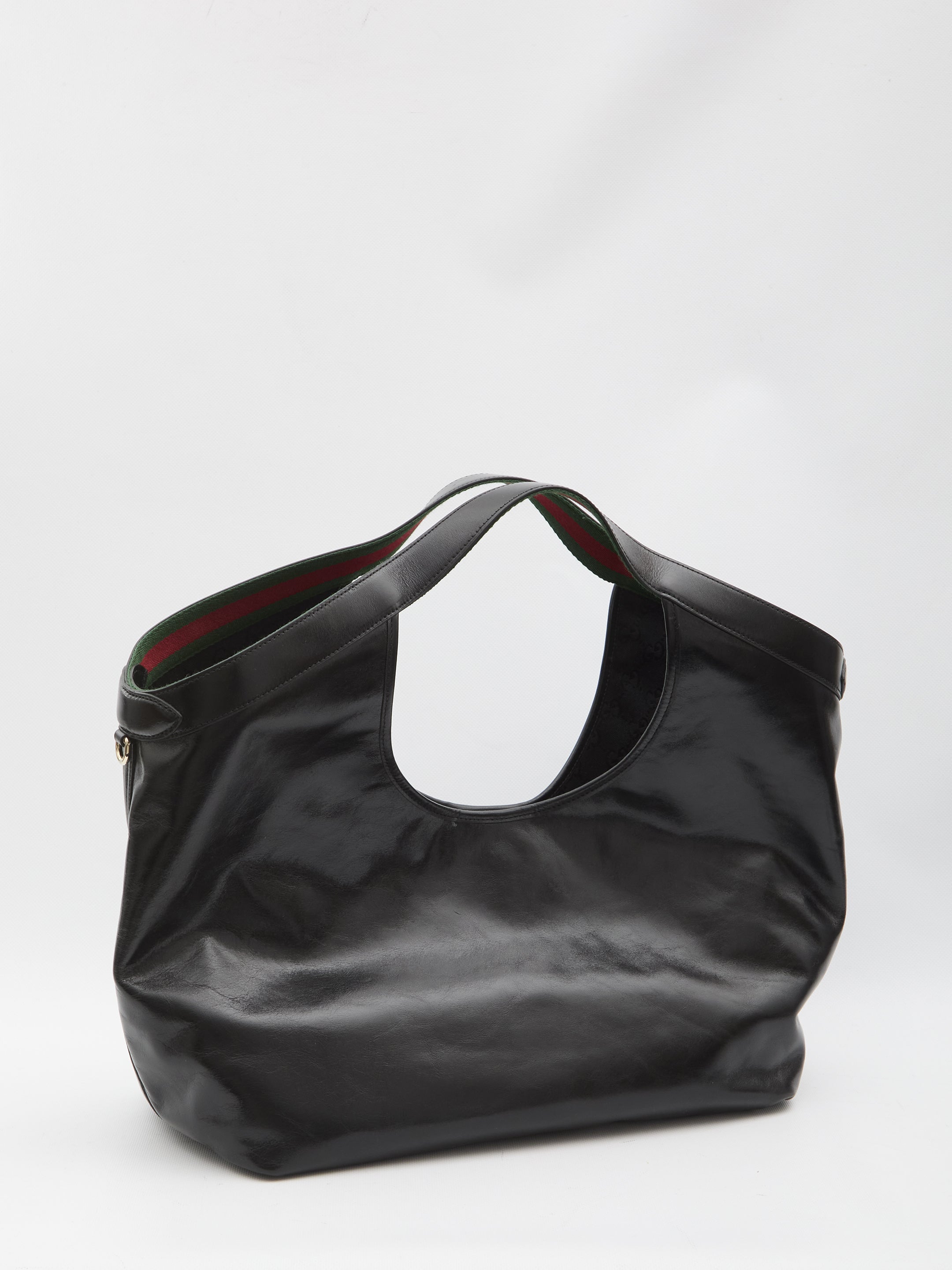 Black Gucci Giglio tote bag with light gold-tone hardware, side angle