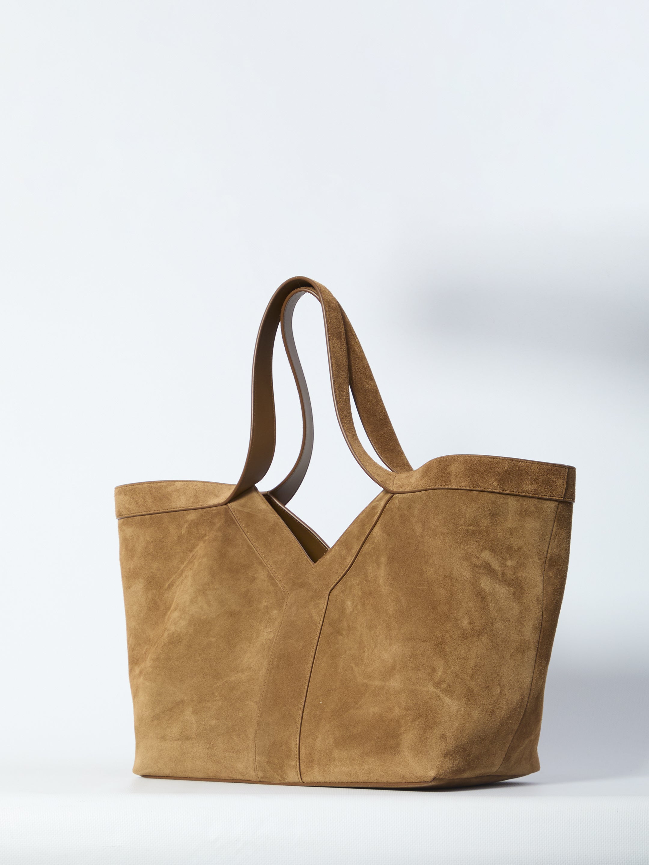 Brown suede Y tote bag small with flat handles, side view by Saint Laurent