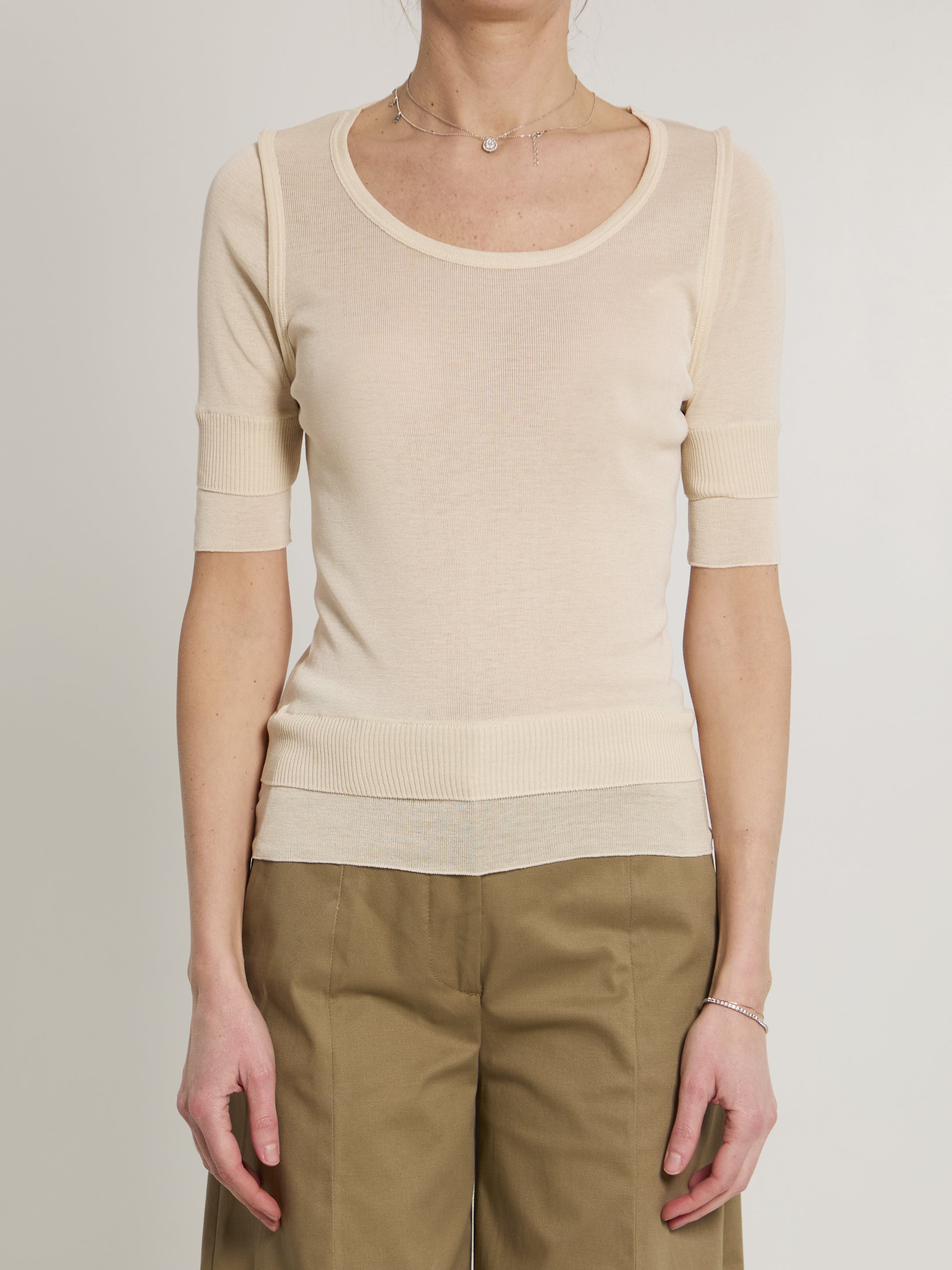 Pink Lemaire seamless top with trompe l'oeil effect, front view