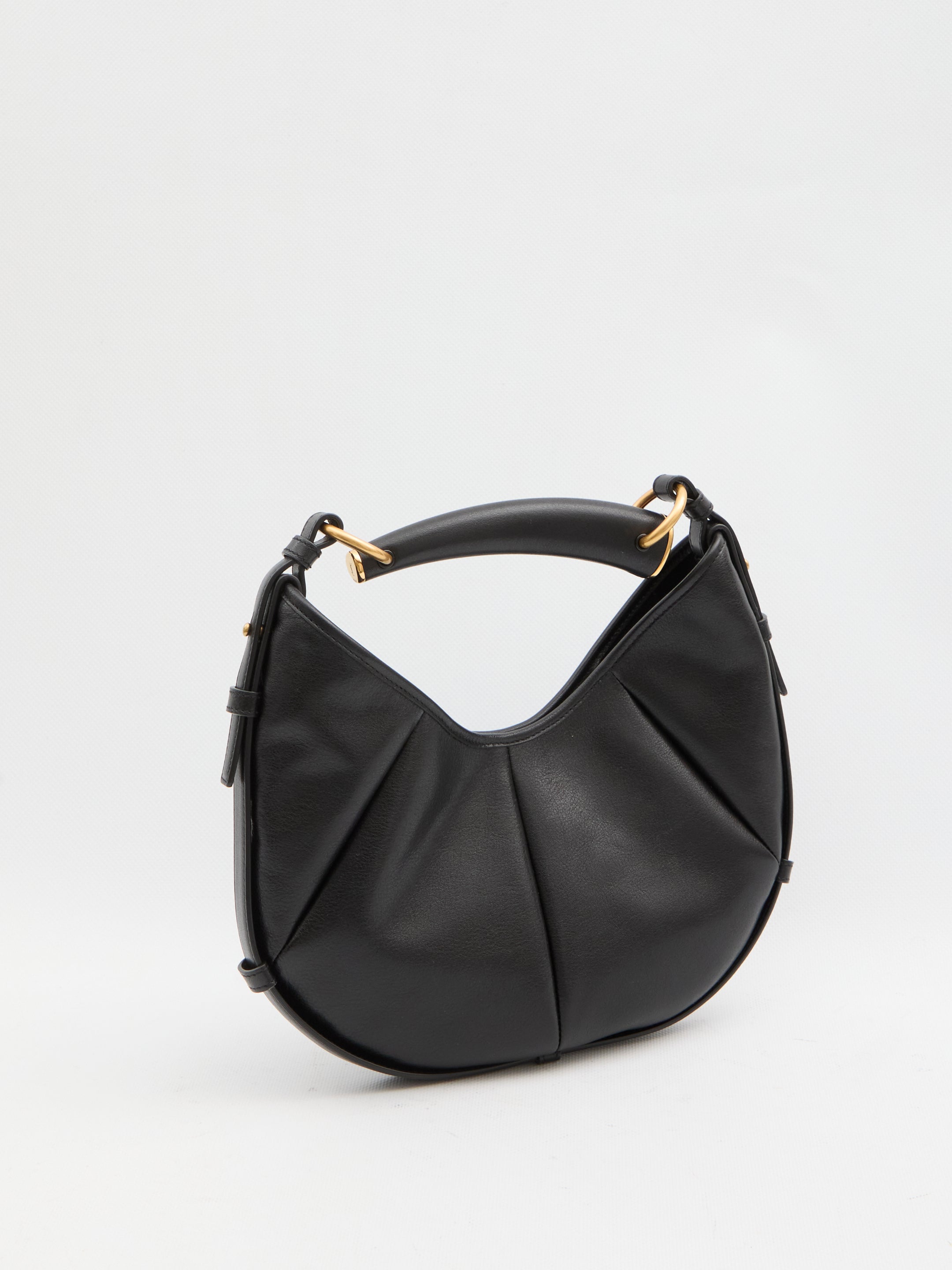 Black quilted calfskin Mombasa shoulder bag by Saint Laurent, side angle showing adjustable handle