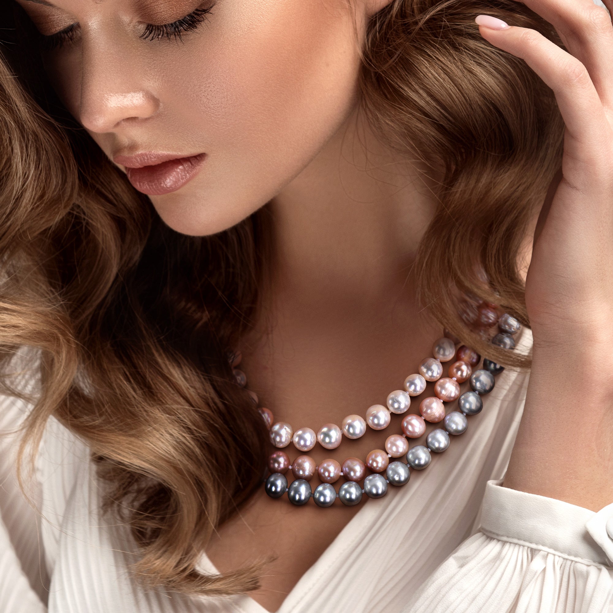 Multi-color freshwater pearl three-strand necklace worn, lifestyle view