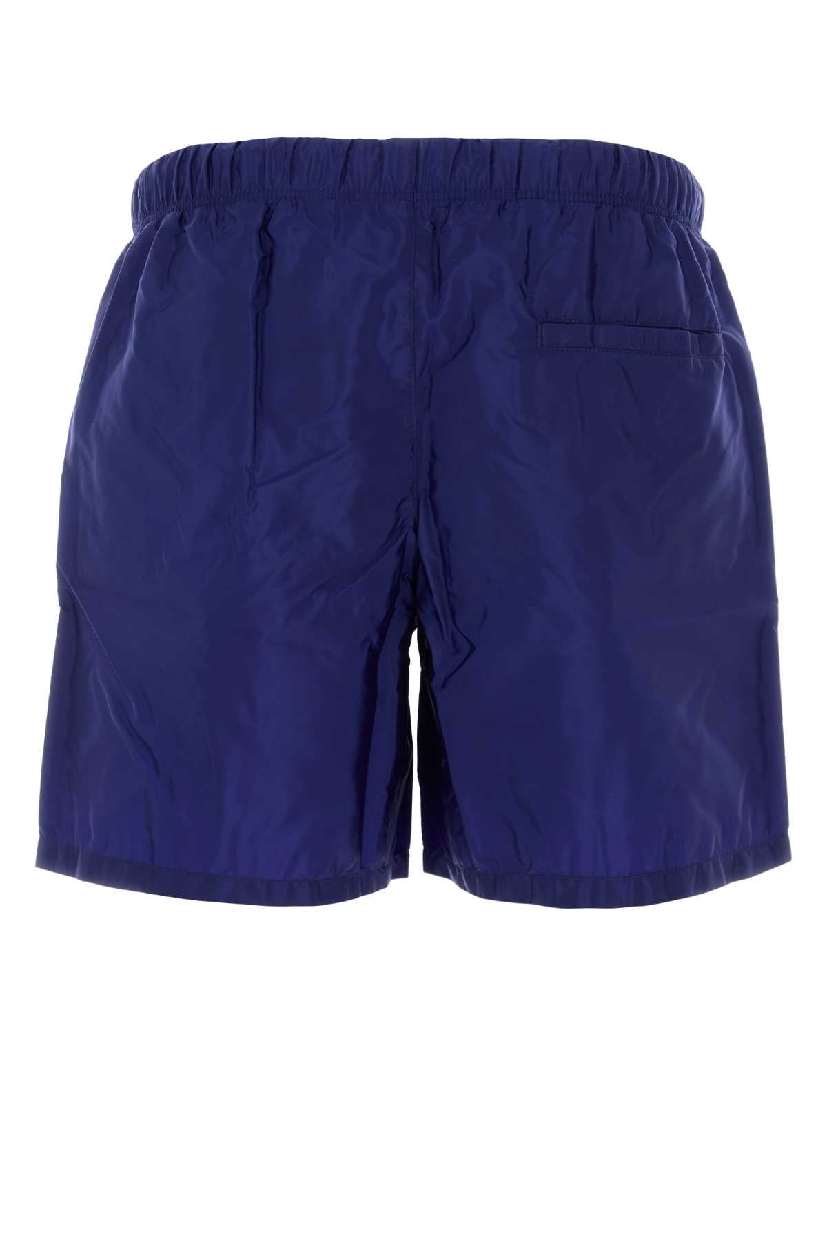 ELECTRIC BLUE RE-NYLON SWIMMING SHORTS Prada