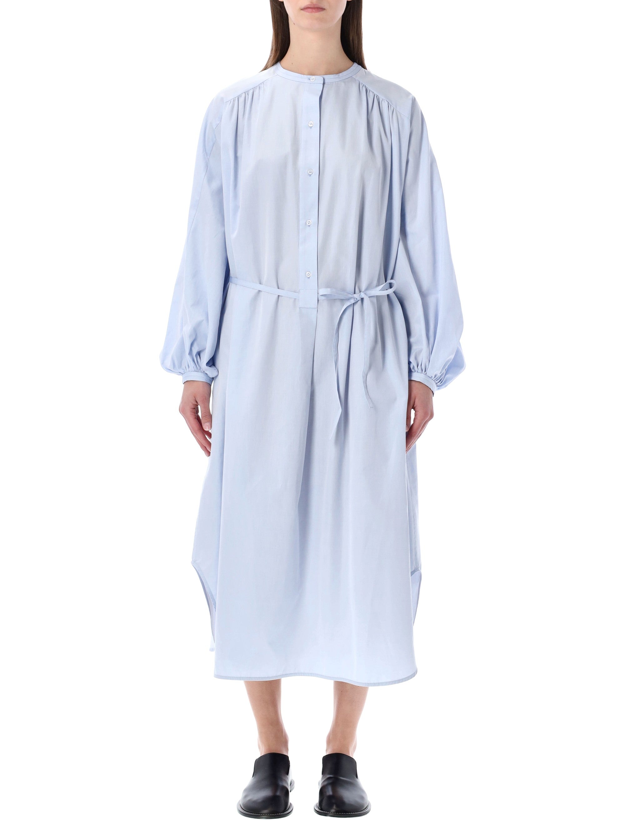 Light blue LOULOU Vitti midi dress with fabric belt, side view