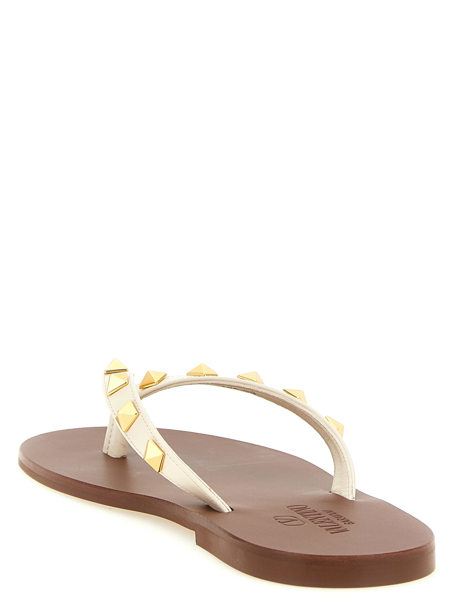 White Valentino Garavani Rockstud sandals, top view showing studs