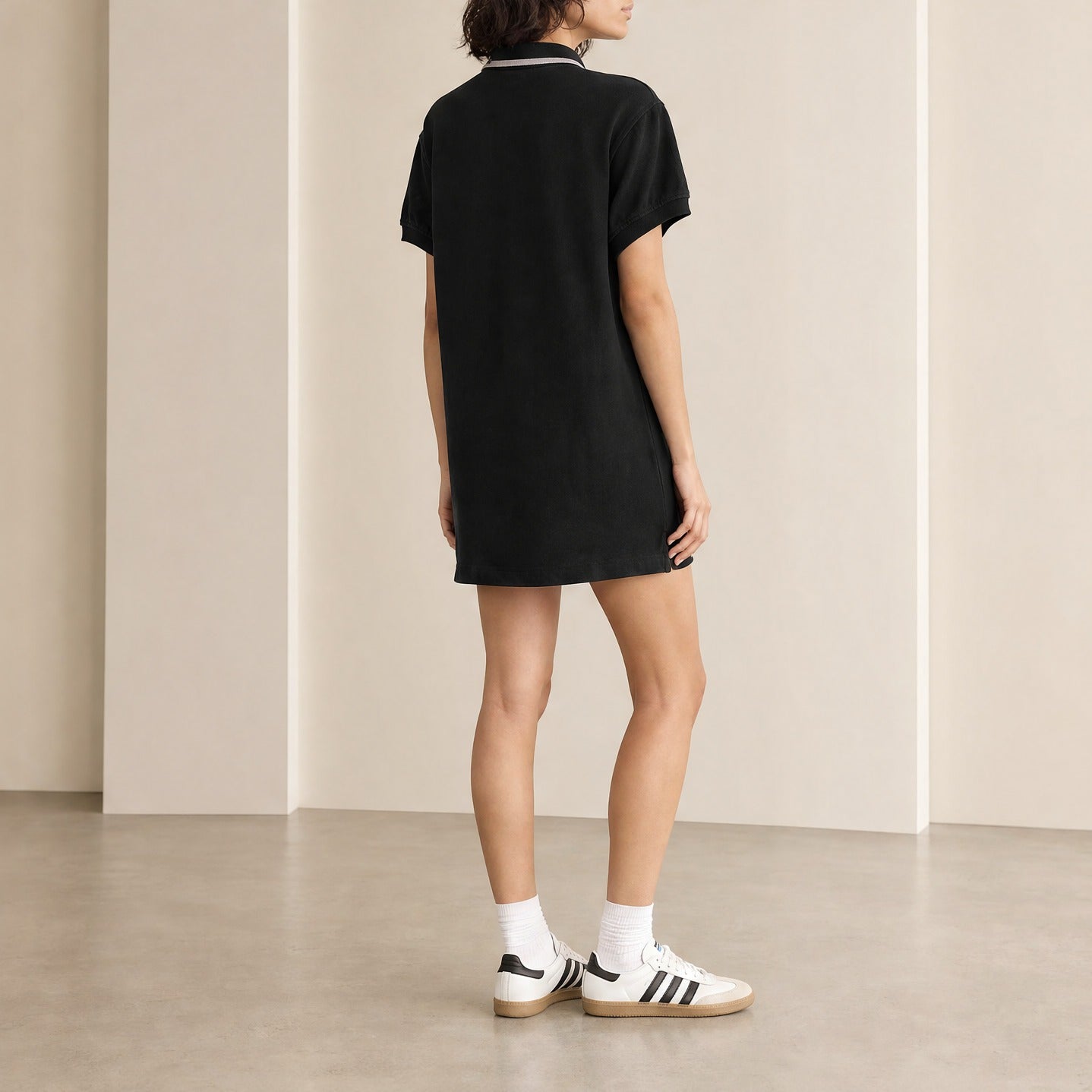 Black polo mini dress by T by Alexander Wang, back detail close-up