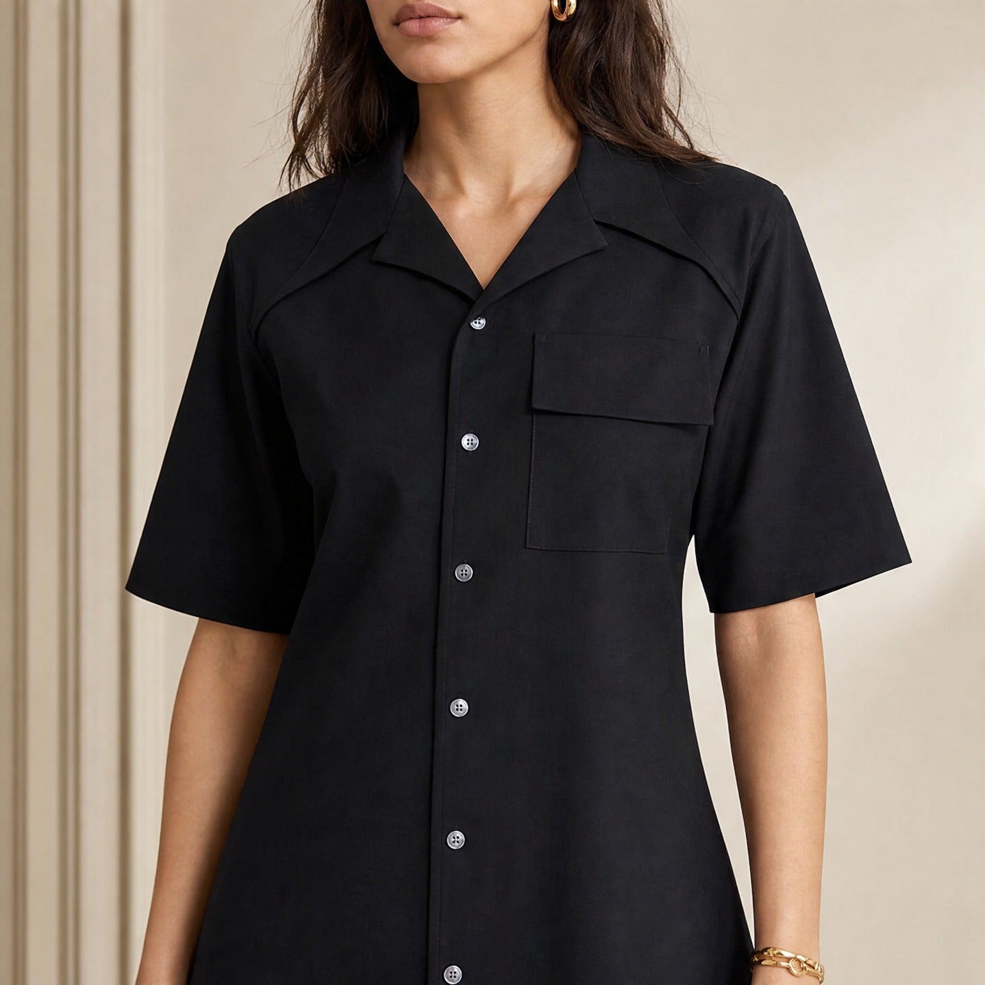 Black wool shirt dress collar and button detail, close-up front by AMI Paris