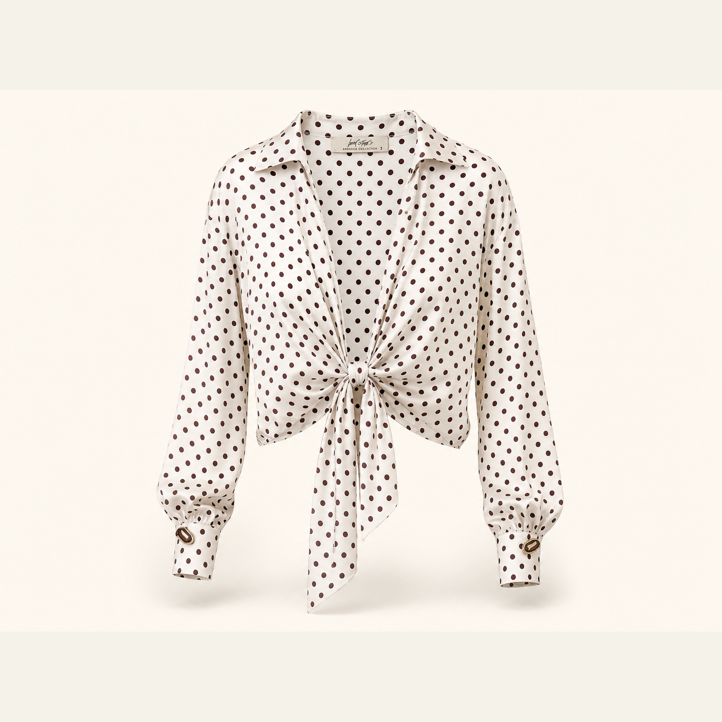 Cream polka dot tie-front shirt with burgundy-black print, flat product shot