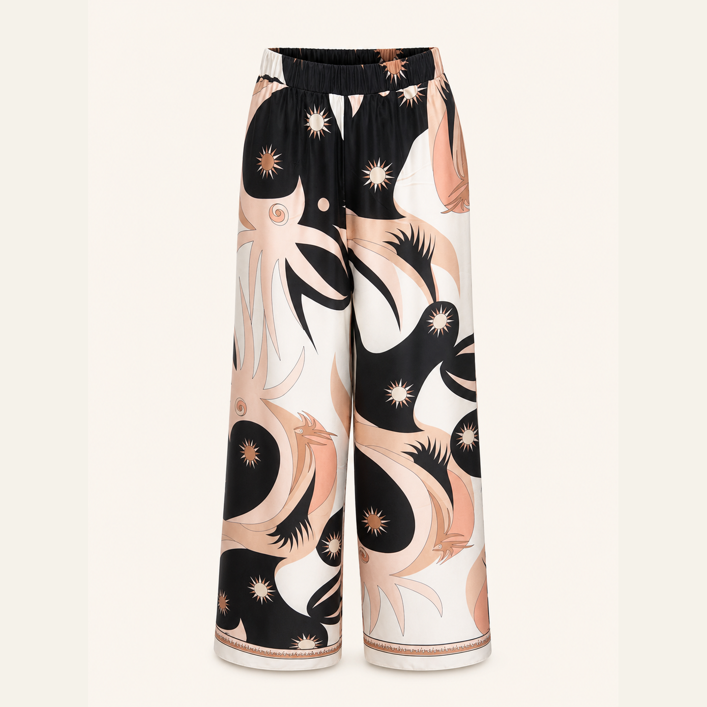 Black multi print palazzo trousers with gold starburst motifs, flat lay by Lord & Taylor Heritage