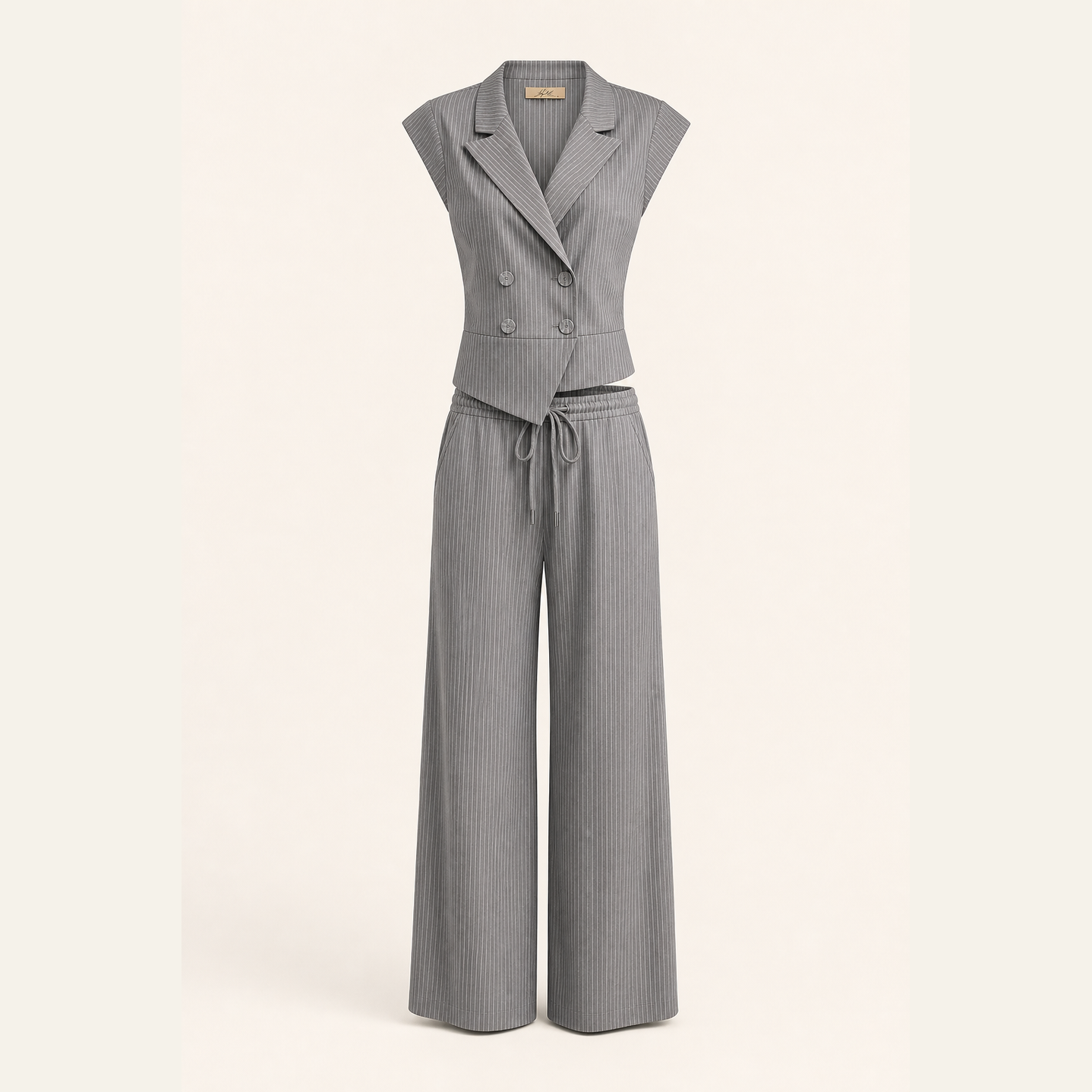 Grey two-piece set flat lay product shot by Lord & Taylor Heritage
