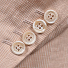 Papaya wool linen suit by Brunello Cucinelli, detail of flap pocket
