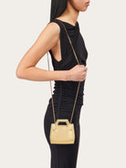 Metallic gold Salvatore Ferragamo Wanda bag, side angle view
