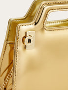 Metallic gold Salvatore Ferragamo Wanda micro bag, top view