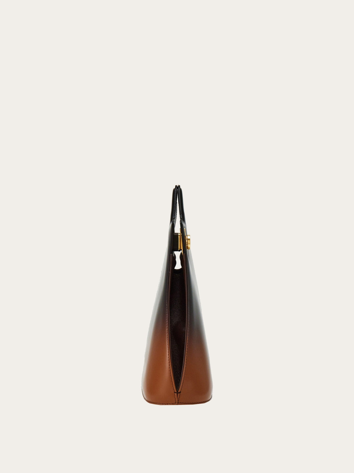 Gold-tone turn-lock hardware on Salvatore Ferragamo ombré handbag, close-up