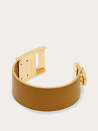 Salvatore Ferragamo leather cuff bracelet in tan showing buckle closure mechanism