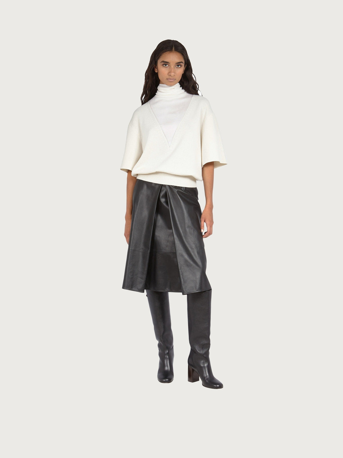 White Salvatore Ferragamo knit top ribbed hem detail, close-up