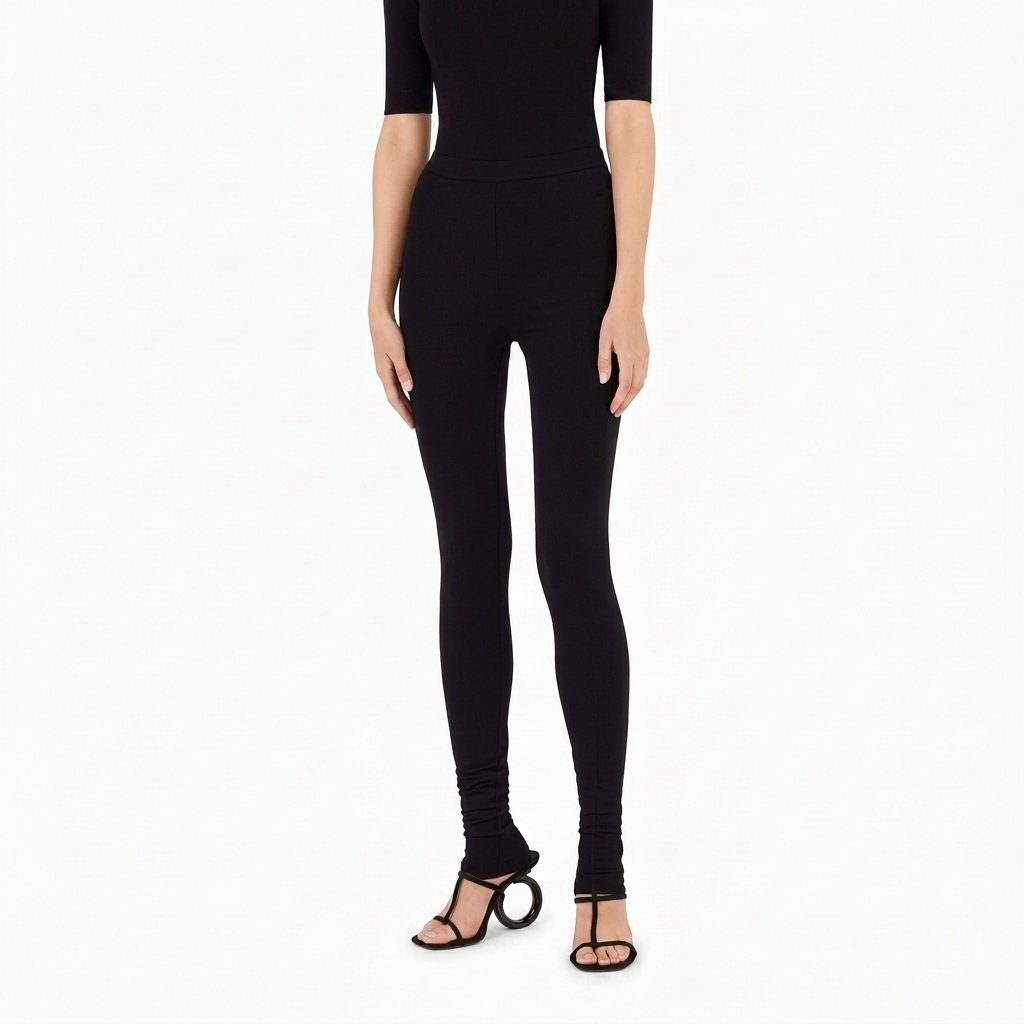 Black Salvatore Ferragamo knit set with long-sleeve top and stirrup leggings, front view