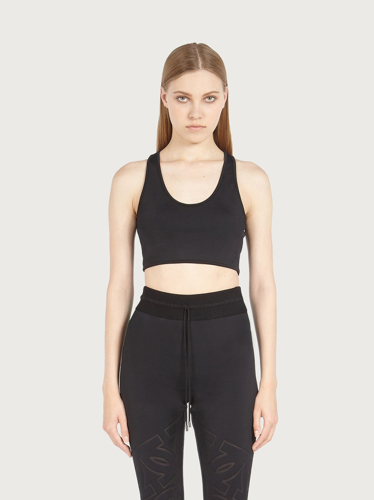 Black Salvatore Ferragamo crop top with mesh panel, back view