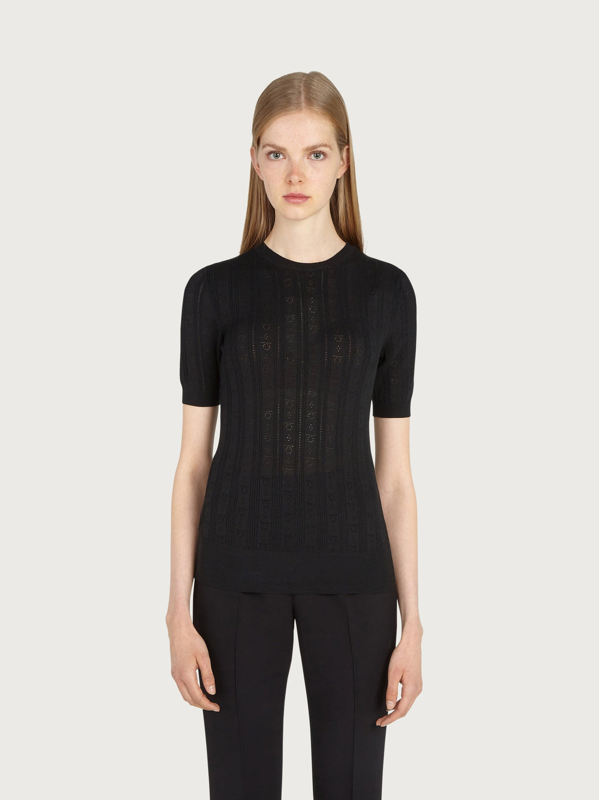 Black Salvatore Ferragamo wool knit top with openwork detail, back view