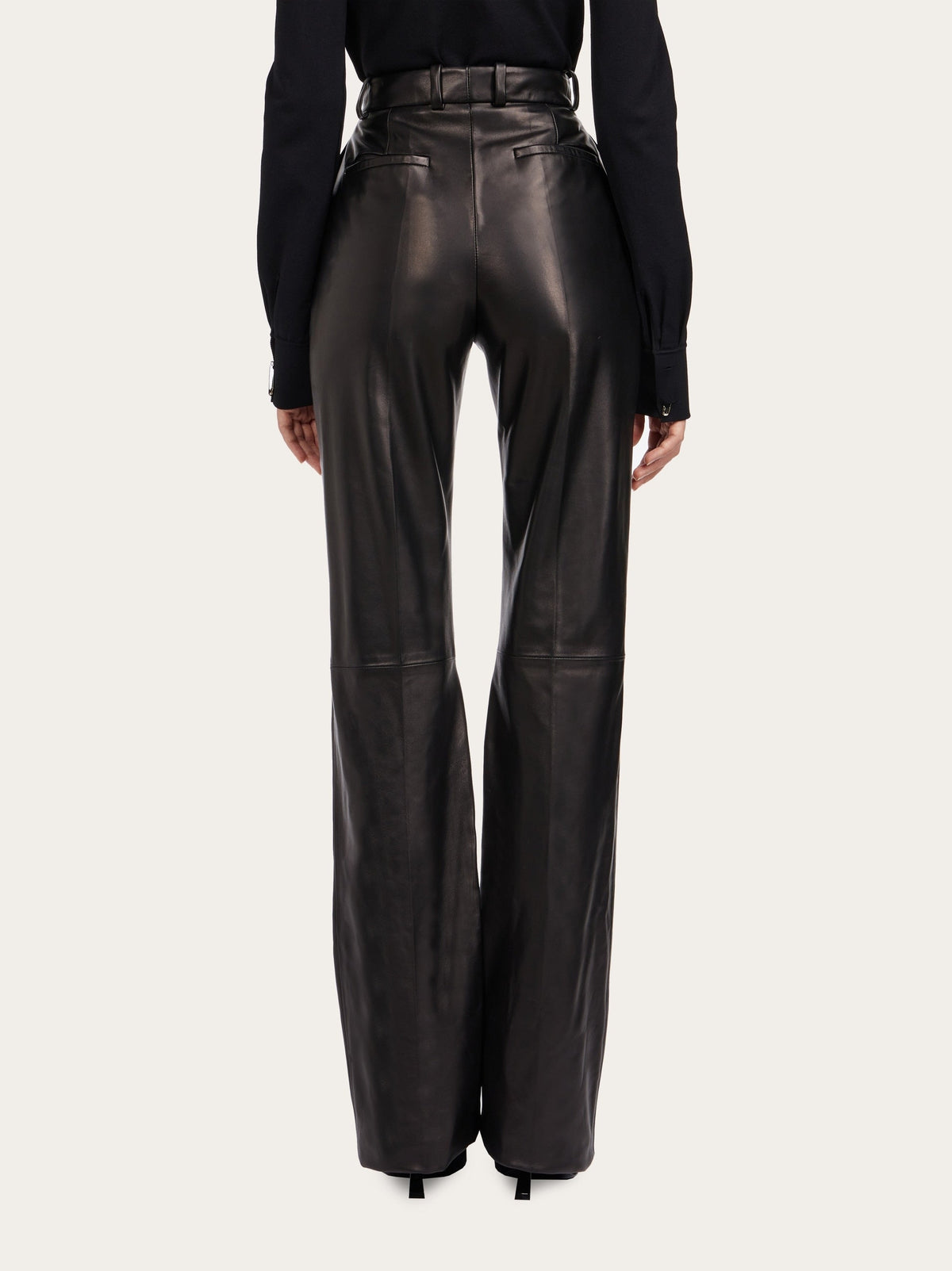 Salvatore Ferragamo black leather trousers, back view with belt loops