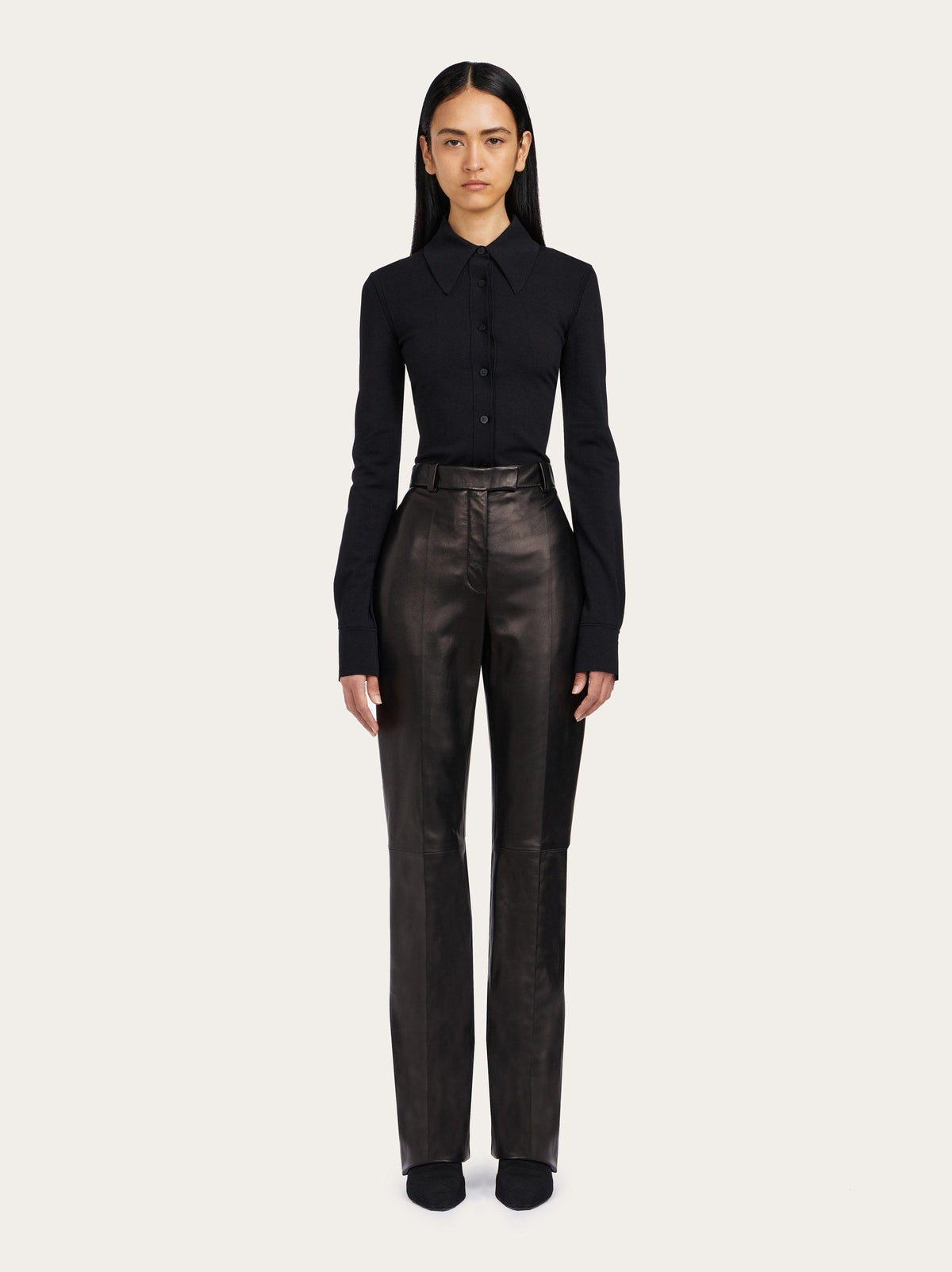 Salvatore Ferragamo straight-leg leather trousers in black, full-length view