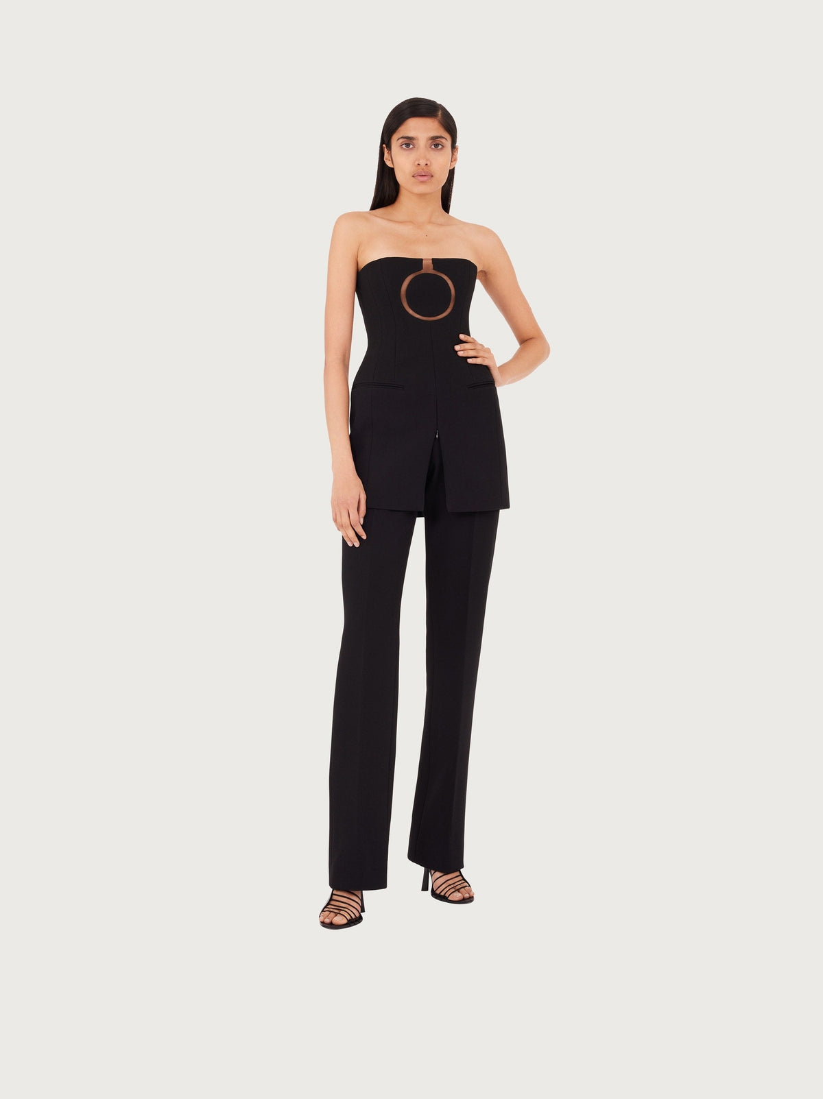 Black Salvatore Ferragamo mini dress, close-up of sweetheart neckline and bustier construction