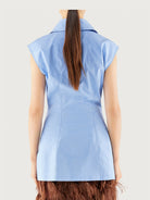 Light blue Salvatore Ferragamo sleeveless shirt, detail of chest pocket and button placket