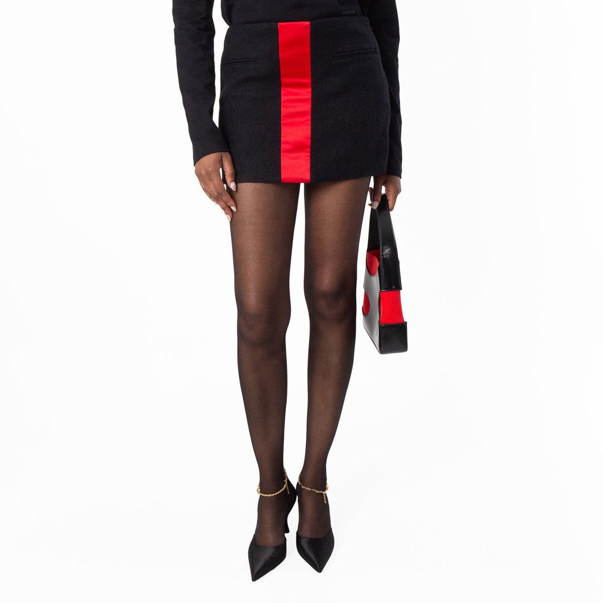 Black Salvatore Ferragamo wool mini skirt, detail of concealed side zip