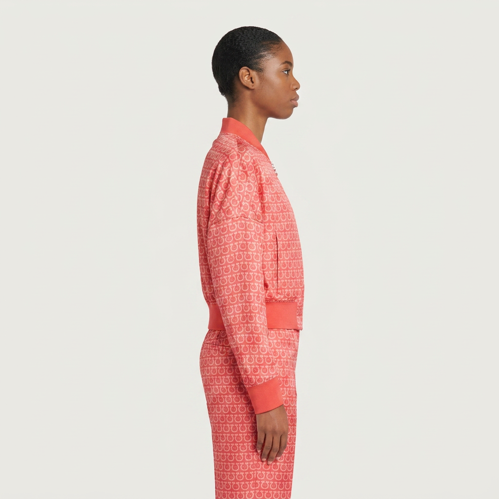 Red coral bomber jacket by Salvatore Ferragamo with chain link print, side view