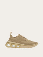 Beige knit round-toe sneaker with Gancini plaque by Salvatore Ferragamo, side view