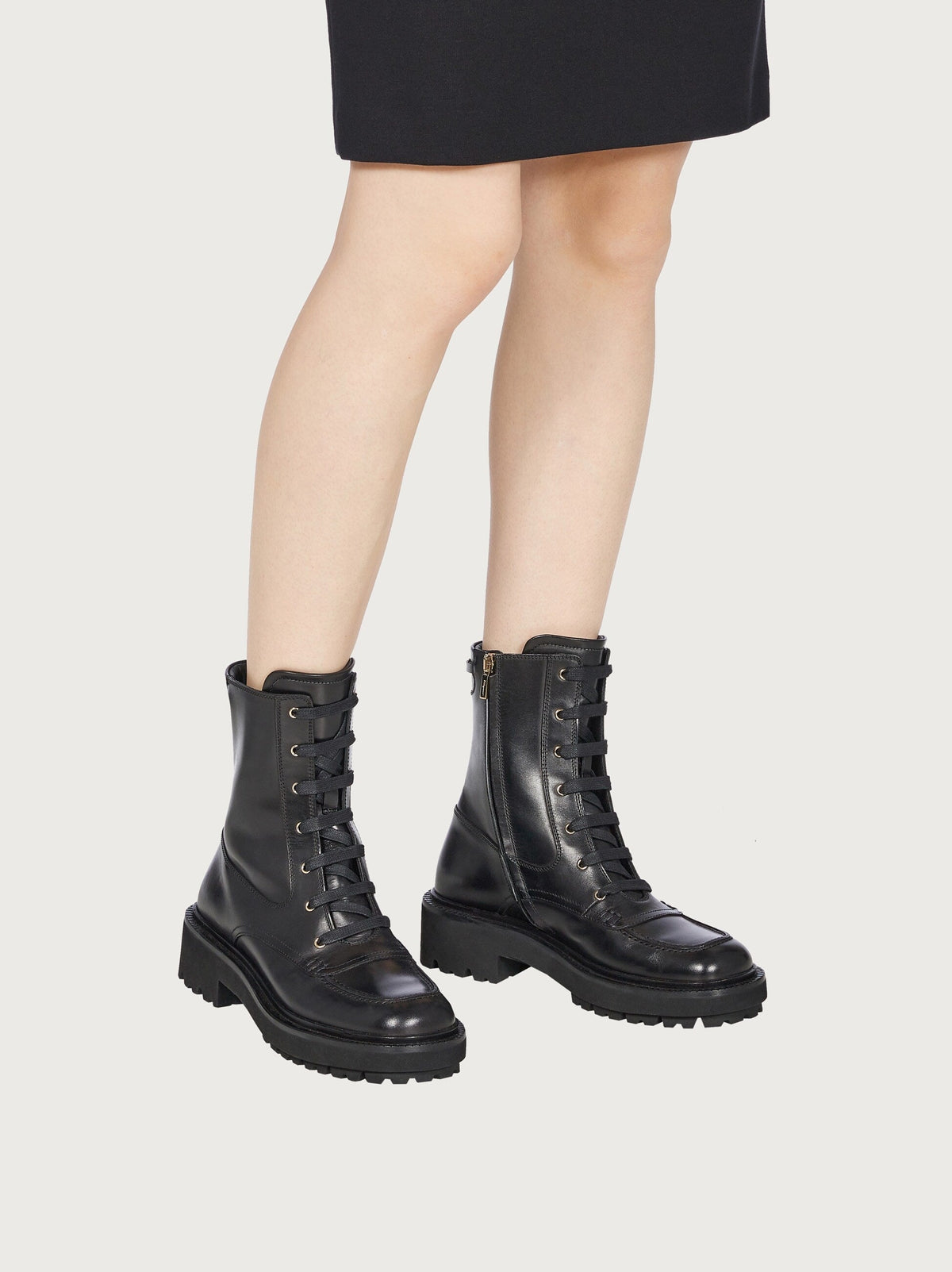 Black leather lace-up boots by Salvatore Ferragamo, rear view