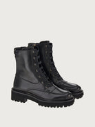 Black calf leather combat boots by Salvatore Ferragamo, three-quarter view