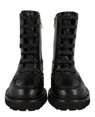 Salvatore Ferragamo black leather lace-up boots, close-up of eyelets and laces