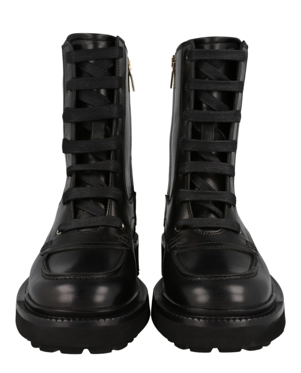 Salvatore Ferragamo black leather lace-up boots, close-up of eyelets and laces