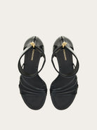Black Salvatore Ferragamo Clethra sandals showing sculptured hand-painted heel detail