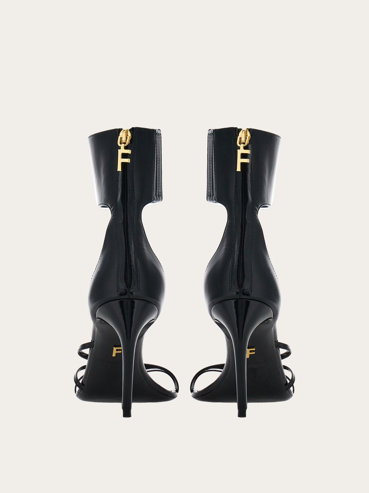 Black Salvatore Ferragamo Clethra sandals showing alligator-print insole detail