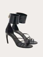 Black Salvatore Ferragamo Clethra sandals with zip closure and custom puller, rear view