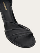 Black Salvatore Ferragamo Clethra nappa leather sandals, top view showing open toe