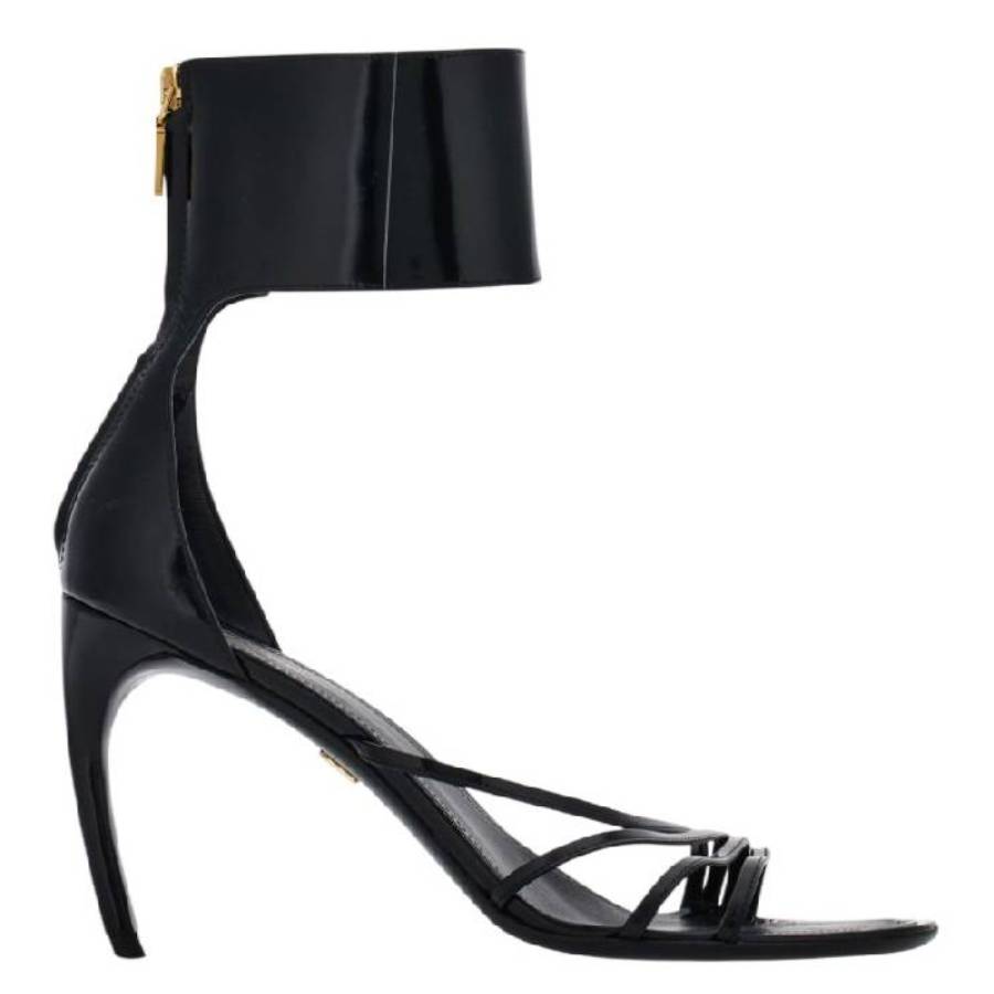 Black Salvatore Ferragamo Clethra sandals showing curved heel profile and sole