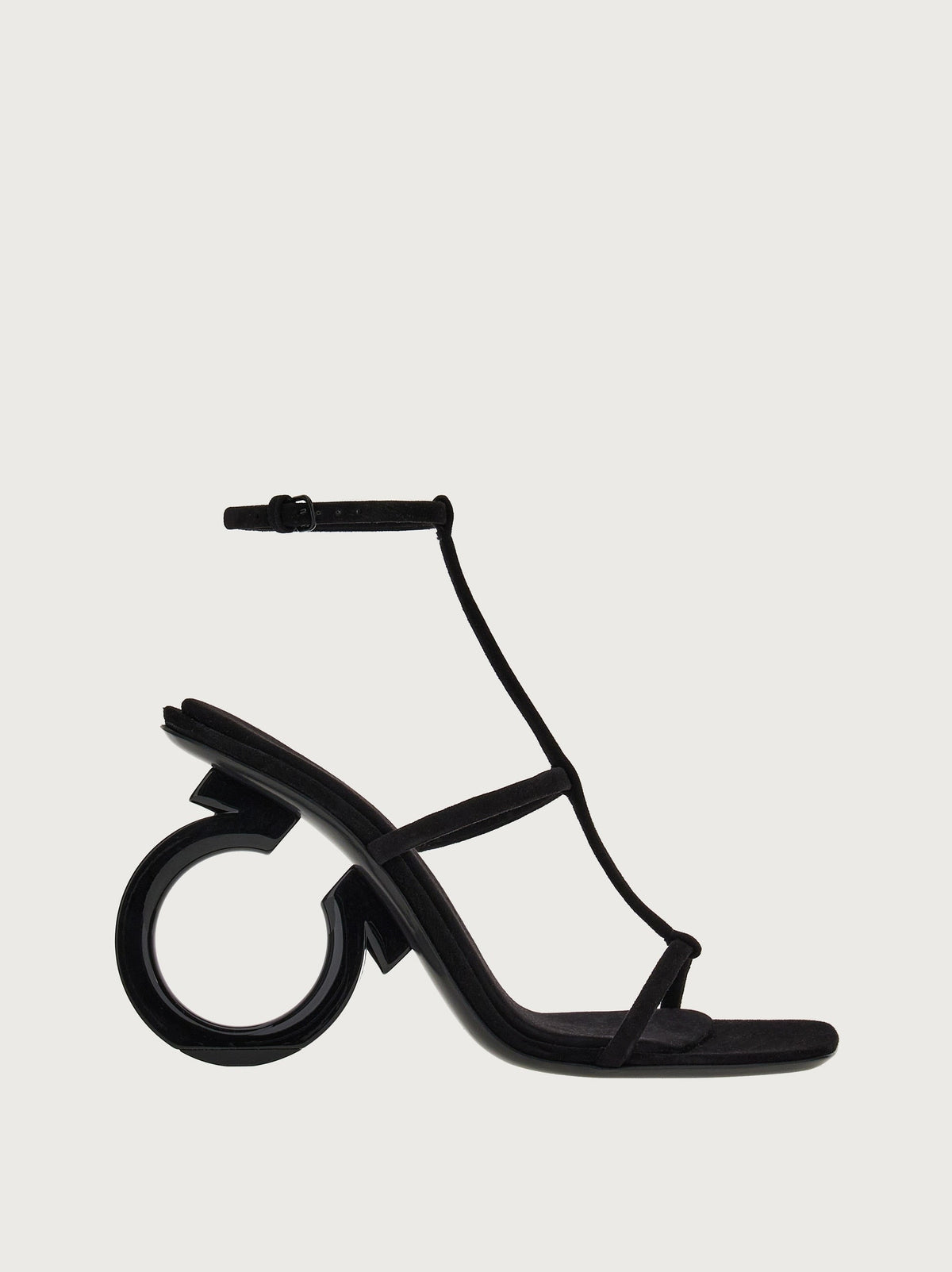 Black suede Elina T-strap sandal with Gancini heel by Salvatore Ferragamo, side view