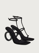 Salvatore Ferragamo Elina sandal, close-up of adjustable ankle strap buckle and suede finish